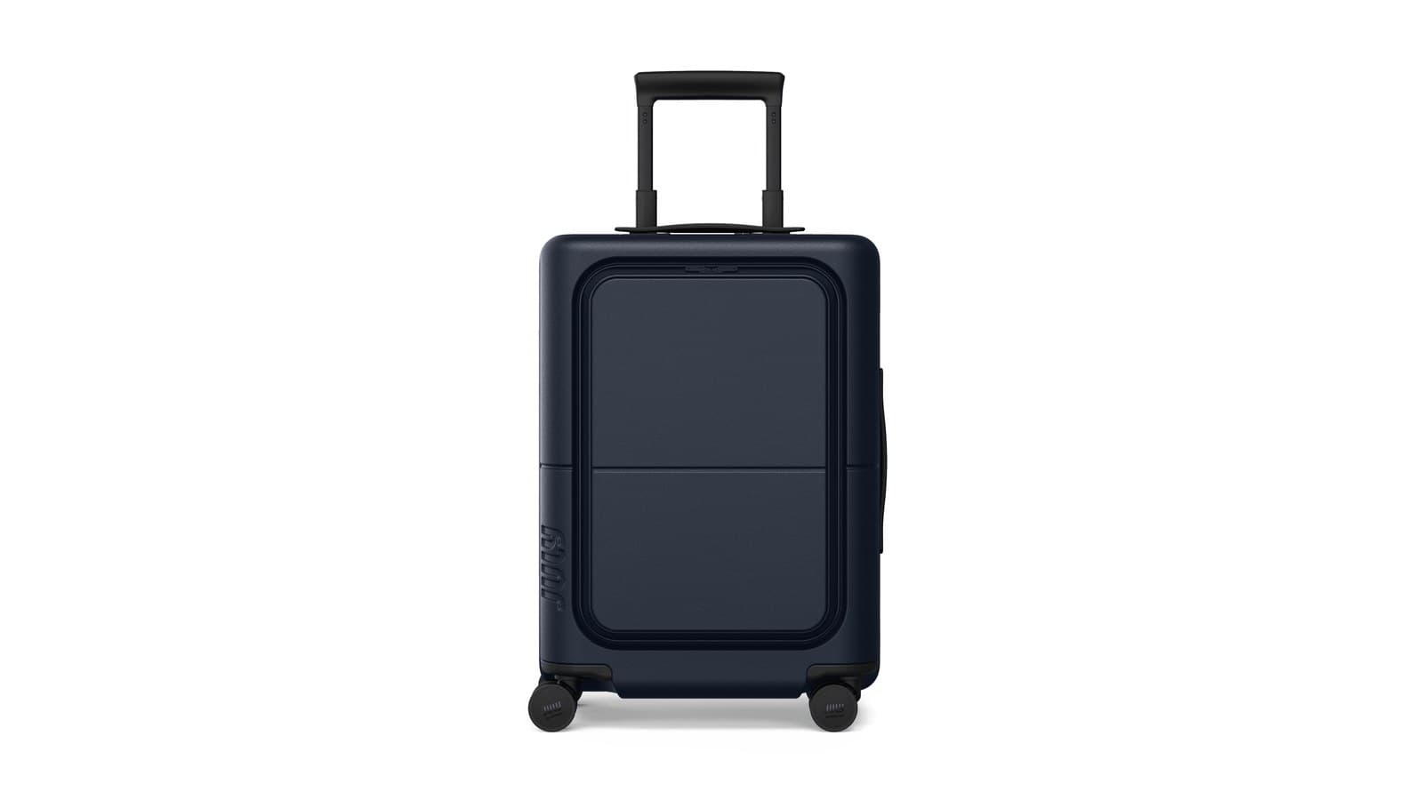 Valise cabine July Carry On Pro ouverte sur un lit d'hôtel